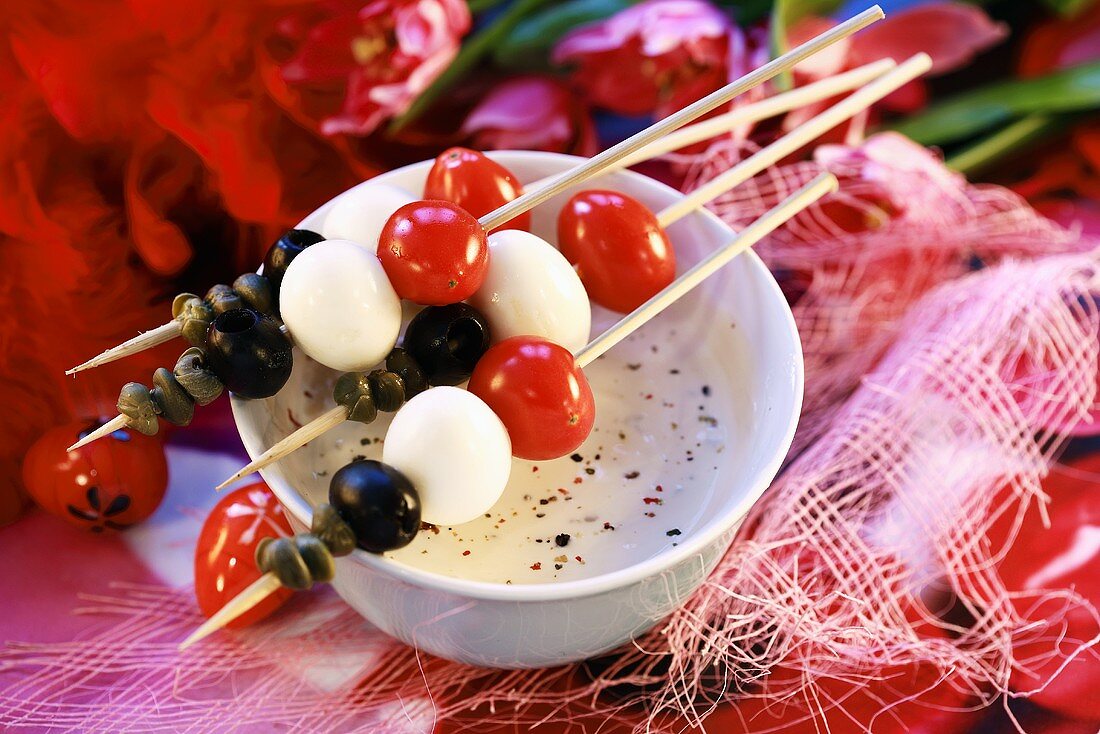Quails' eggs, cherry tomatoes & olives on skewers (Easter)