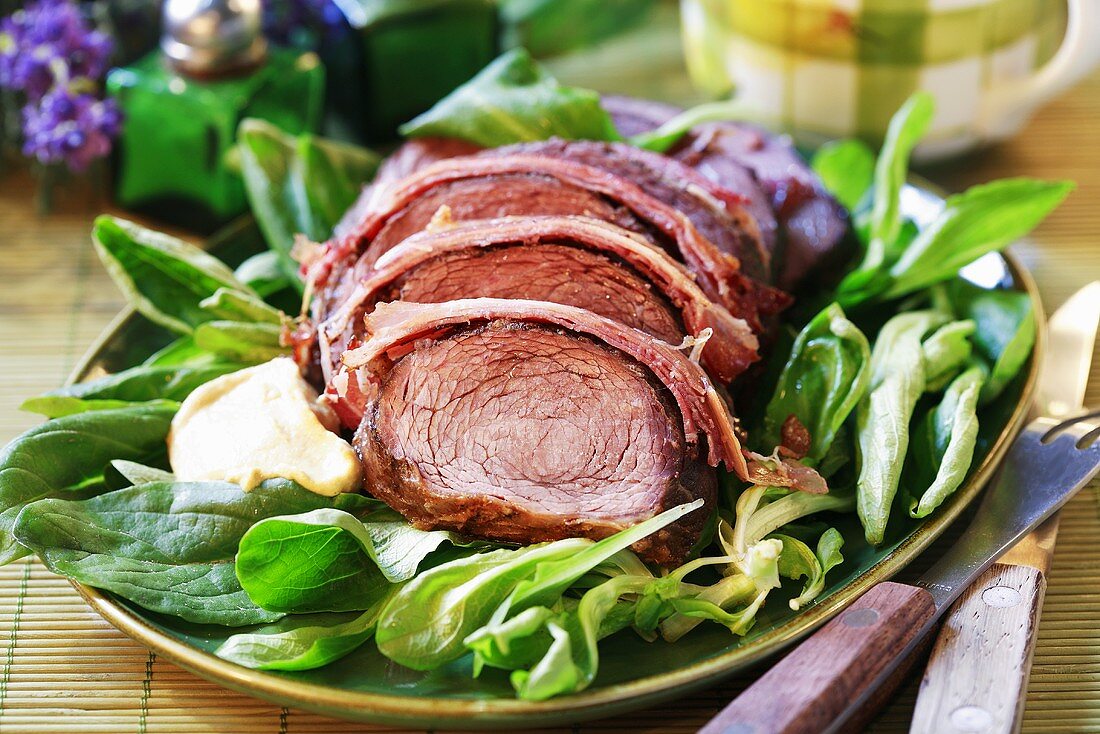 Roast beef wrapped in prosciutto