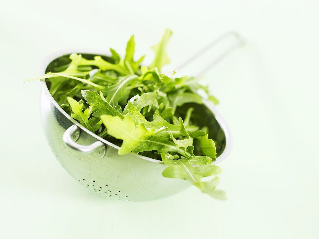 Fresh rocket in colander