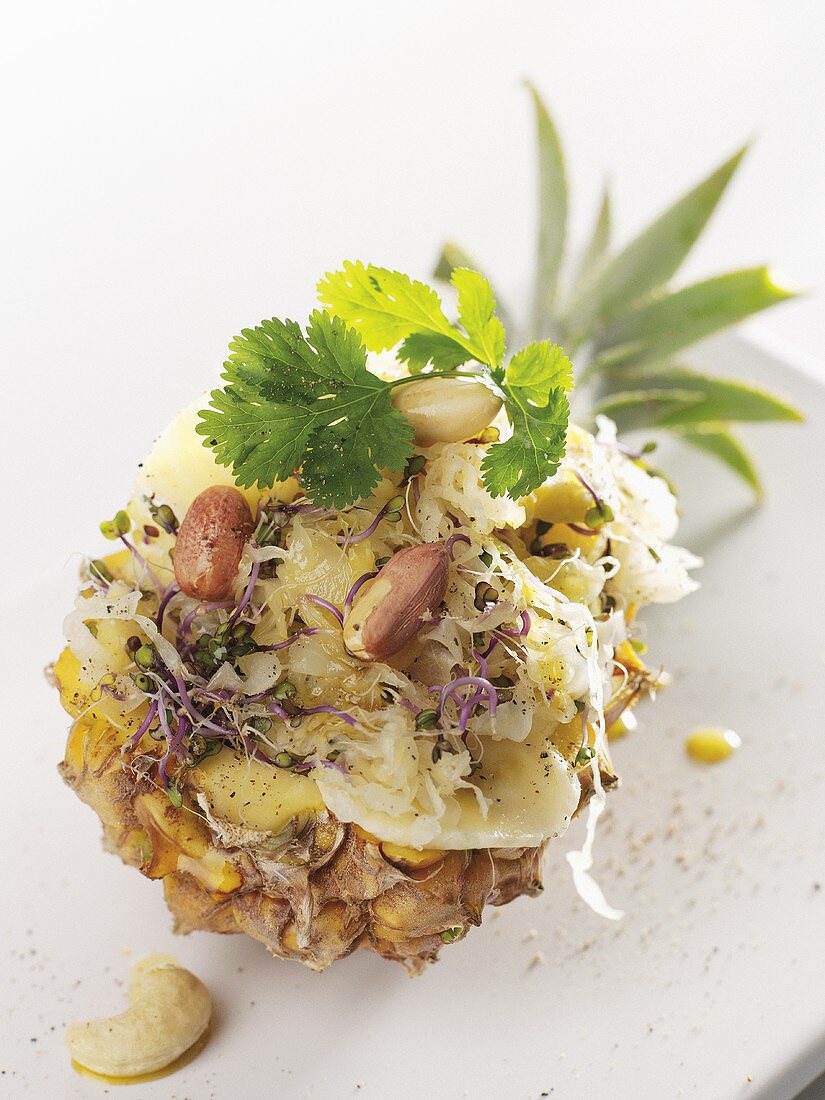 Pineapple stuffed with sauerkraut salad