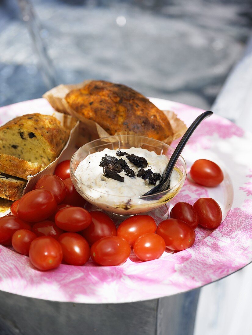 Savoury cake with olive cream and tomatoes