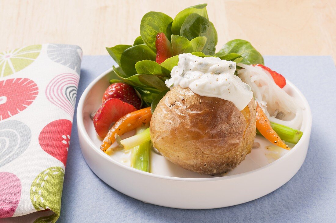 Baked potato with herb quark and corn salad