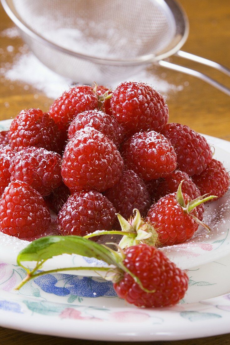 Raspberries with icing sugar