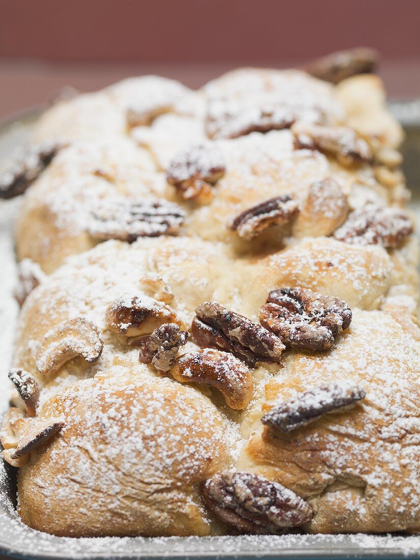 Rohrnudeln (yeast dumplings) with nuts and icing sugar