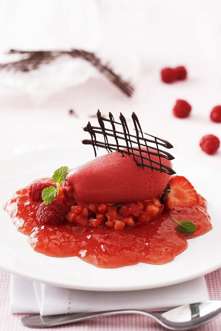 Raspberry ice cream on rhubarb sauce