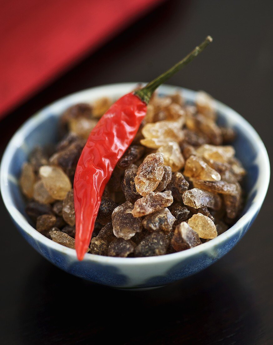 Small bowl of sugar crystals with chilli