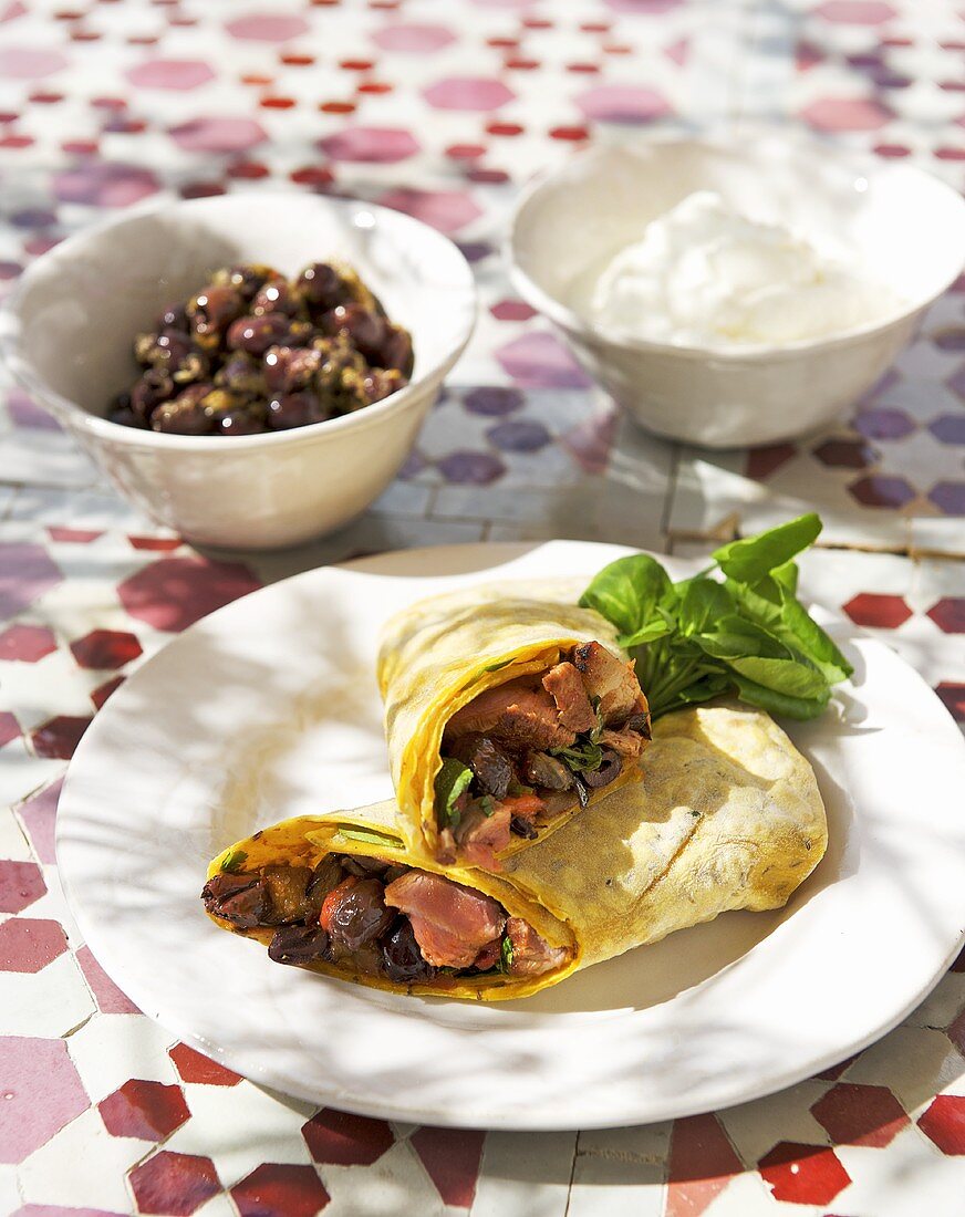 Moroccan flatbread wraps with lamb and harissa filling
