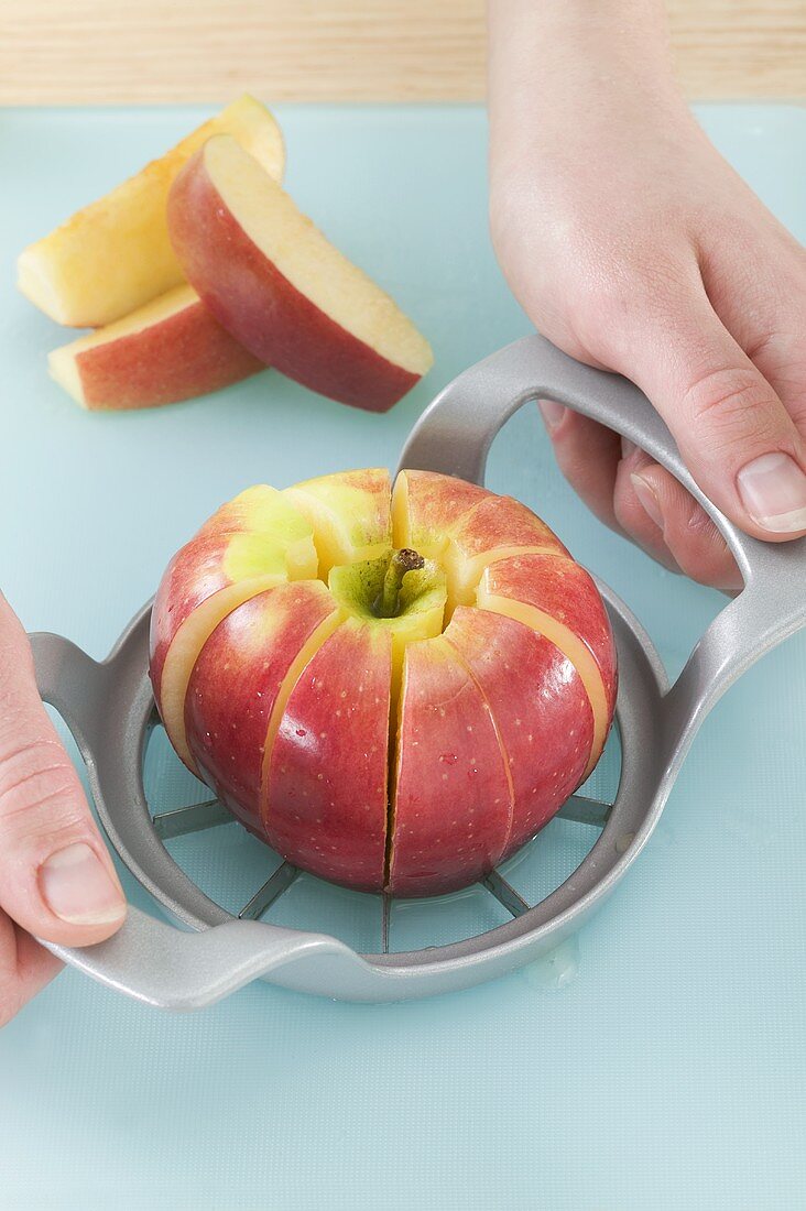 Apple with apple slicer and corer