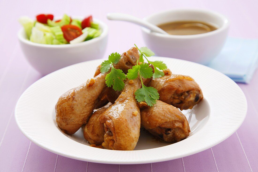 Garlic chicken legs with side salad