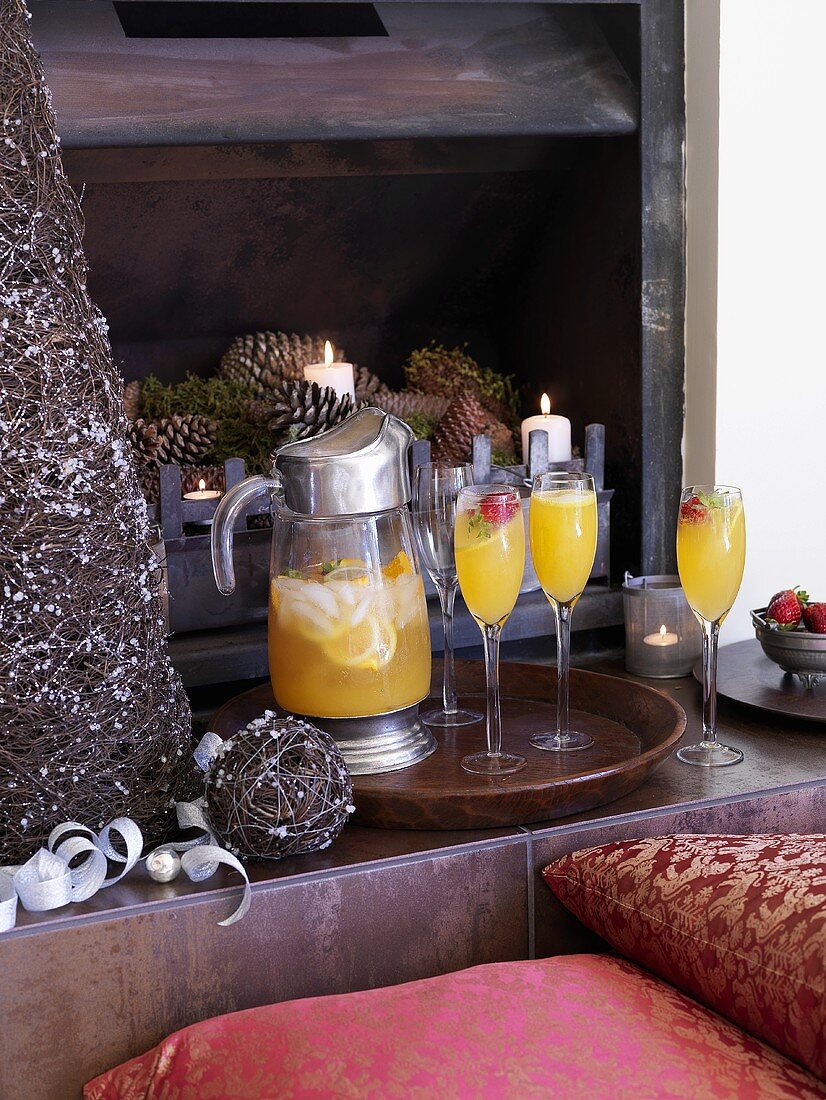 Sangria in a jug and glasses with Christmas decorations