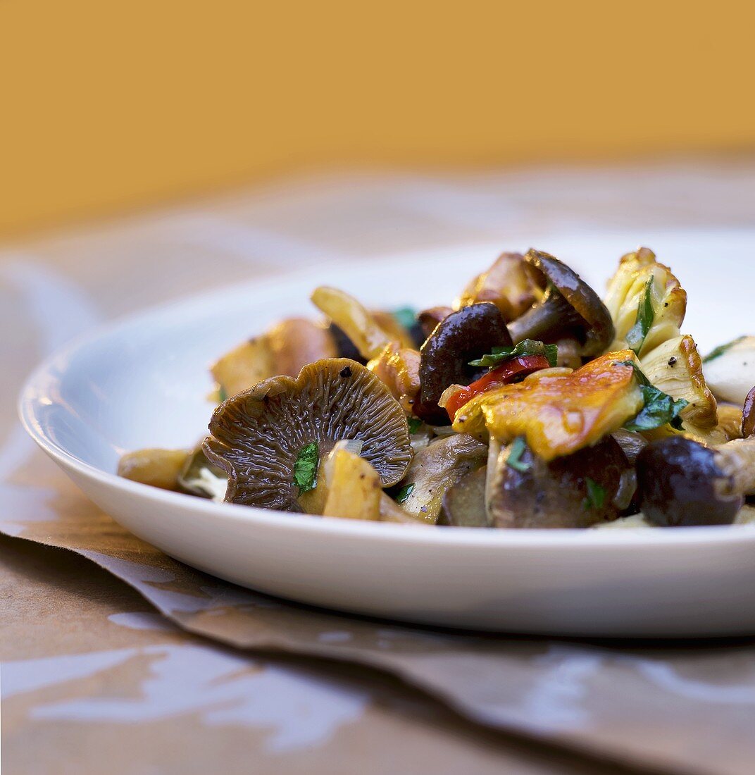 Fried mushrooms with olive oil, chilli and basil