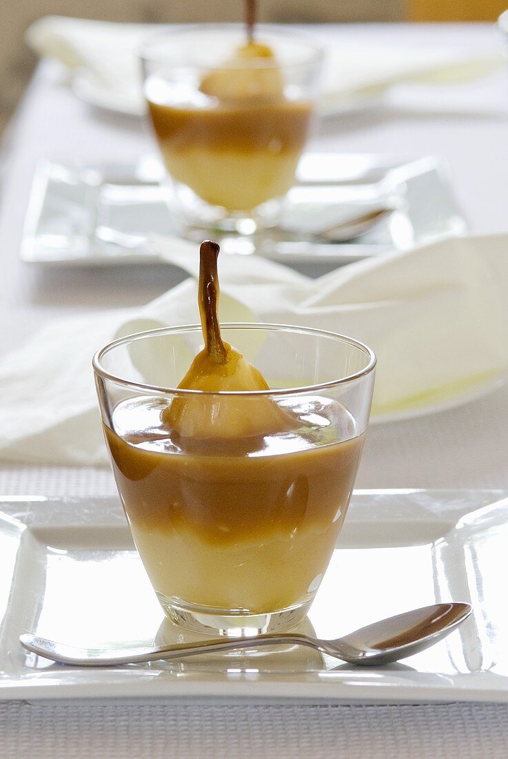 Poached pears in caramel cream