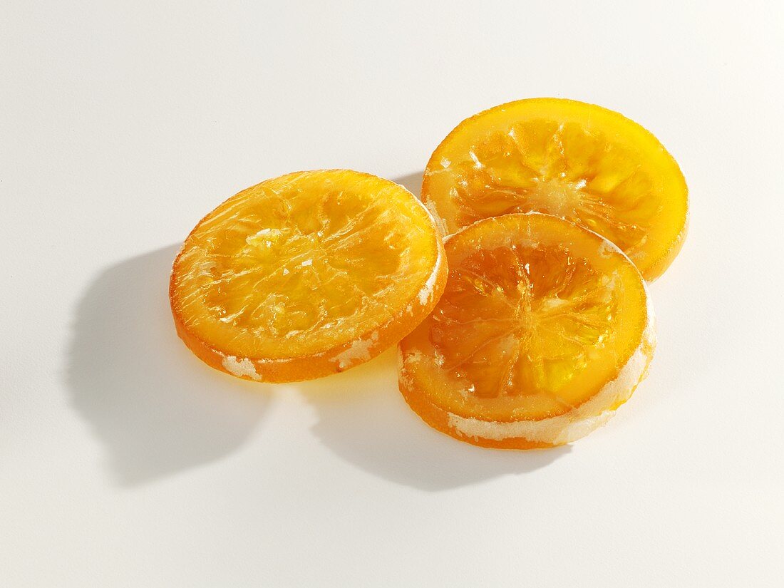 Drei Scheiben kandierte Orangenscheiben