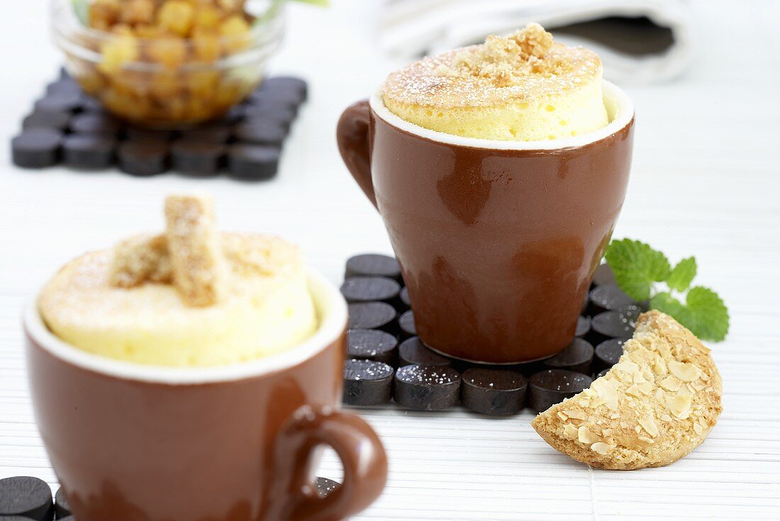 Quark soufflé with pineapple in two espresso cups