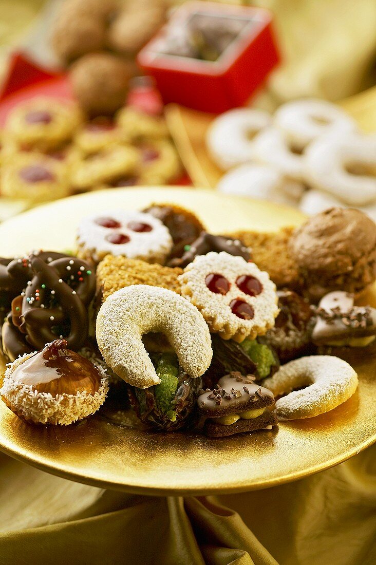 Assorted biscuits on a gold plate