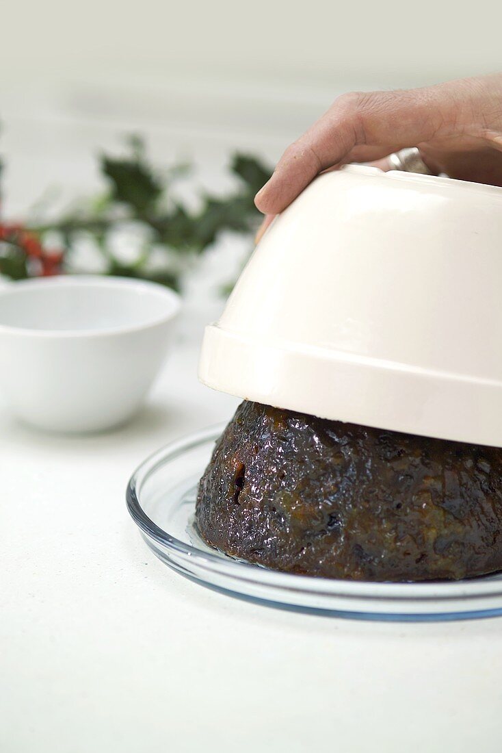 Turning a Christmas pudding out of the basin