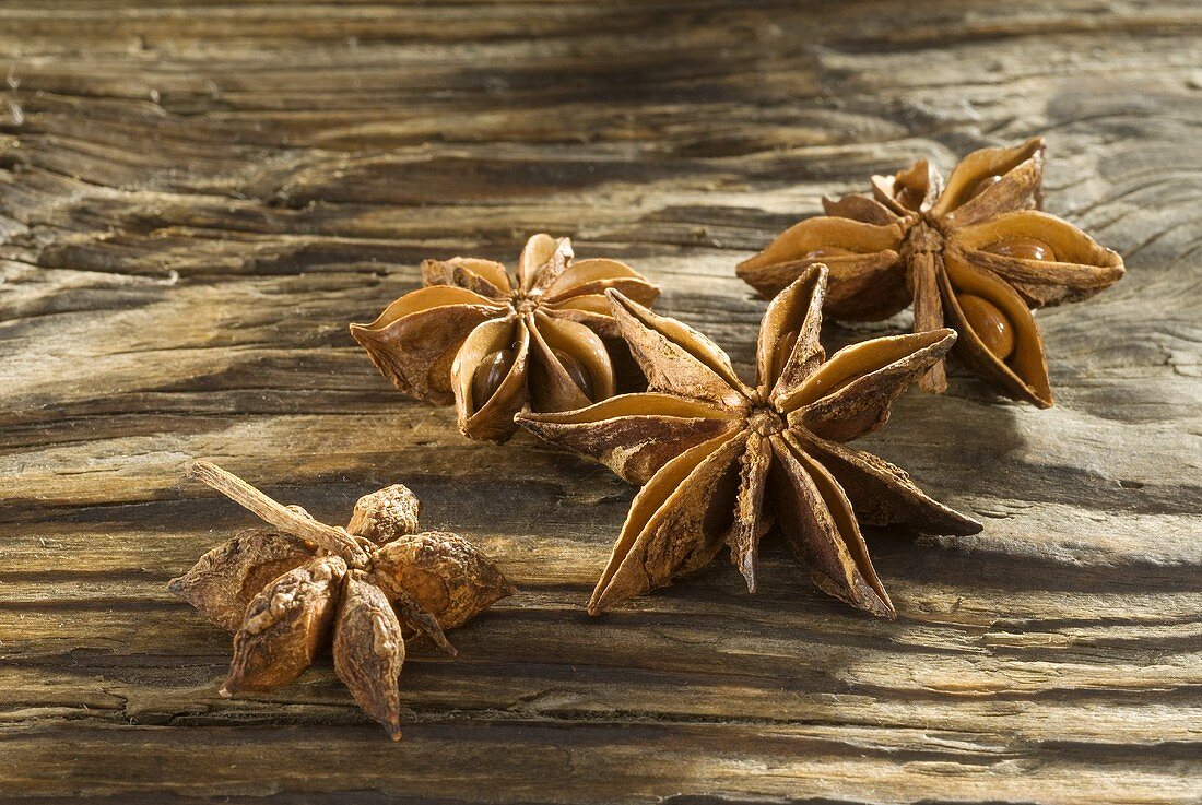 Star anise on wooden background