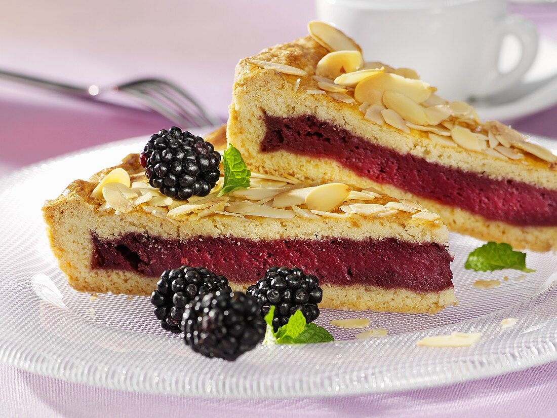 Blackberry tart with flaked almonds