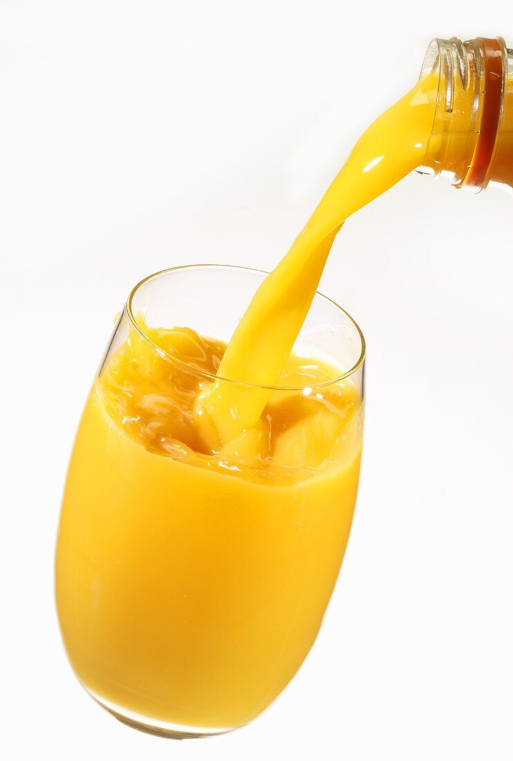 Pouring orange juice