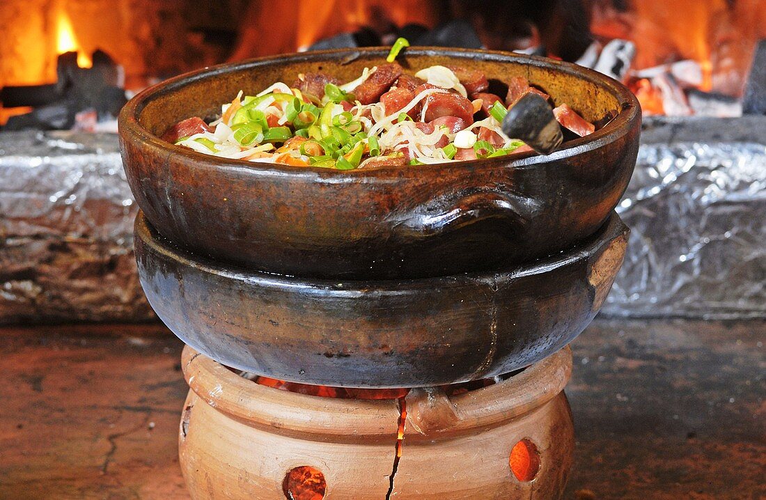 Pan-cooked sausages, onions and dried meat (Brazil)