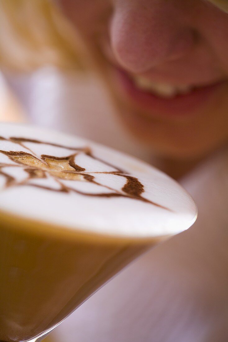 Girl drinking tiramisu coffee