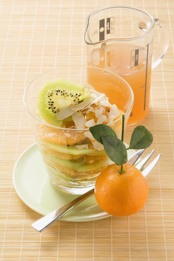 Mandarin oranges with kiwi fruit and coconut