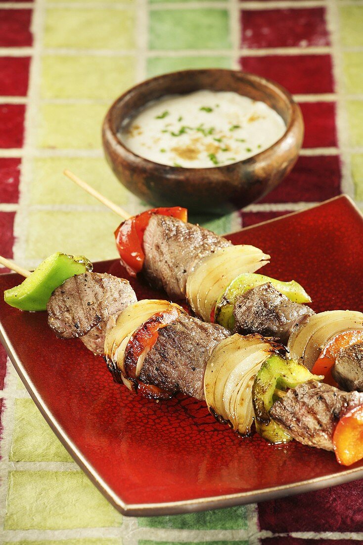 Grilled lamb kebabs with yoghurt sauce