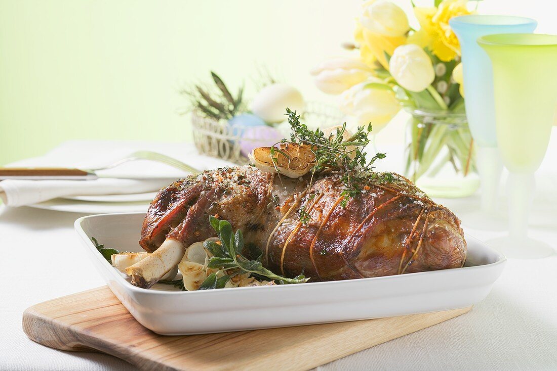 Roast lamb shank with herbs for Easter