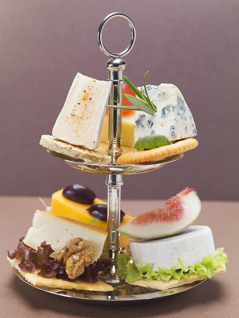 Assorted cheese appetisers on tiered stand