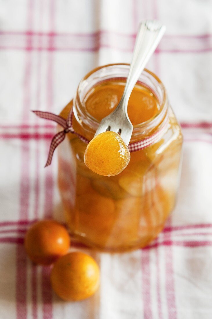 Kumquat compote in a jar