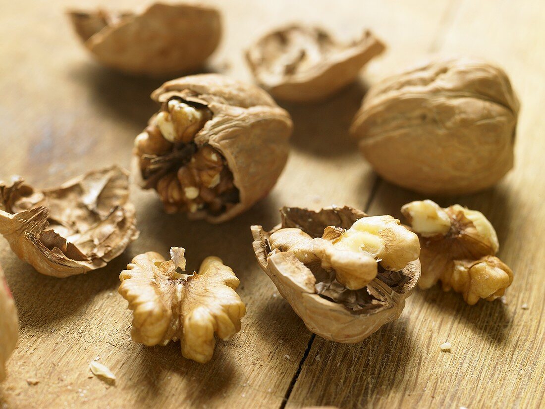 Walnuts, unshelled and cracked open