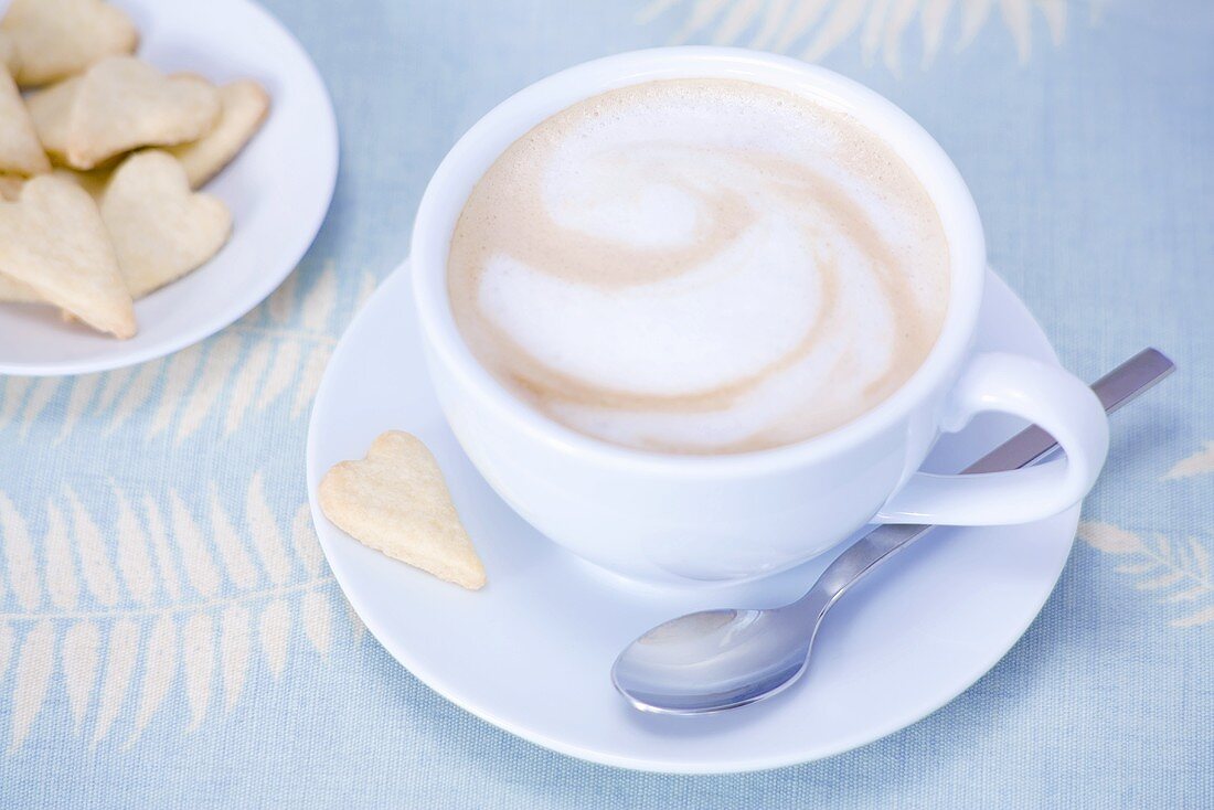 Cappuccino and heart-shaped biscuits