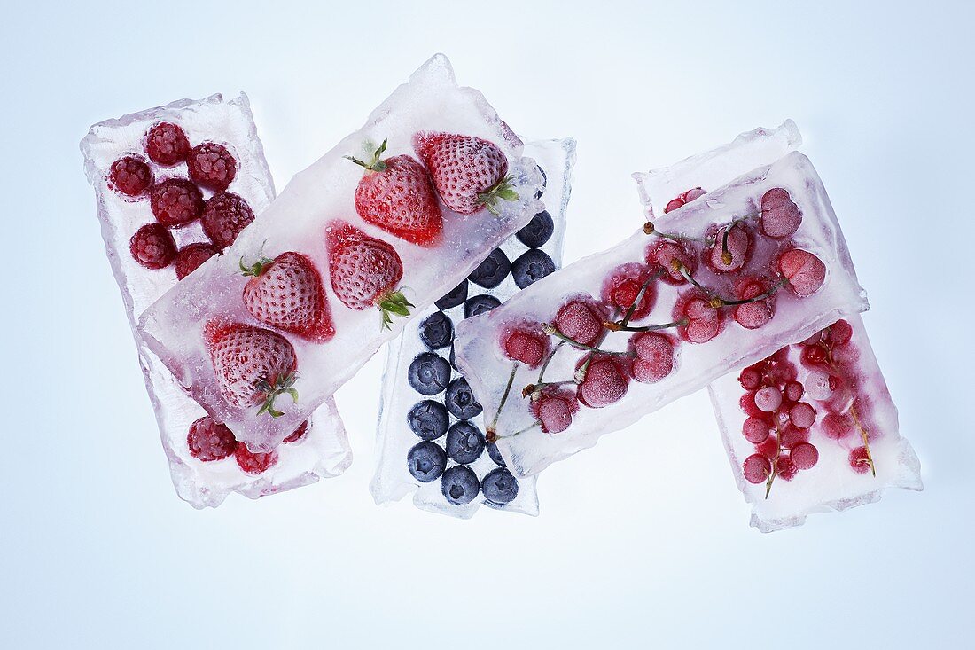 Fruit frozen in blocks of ice