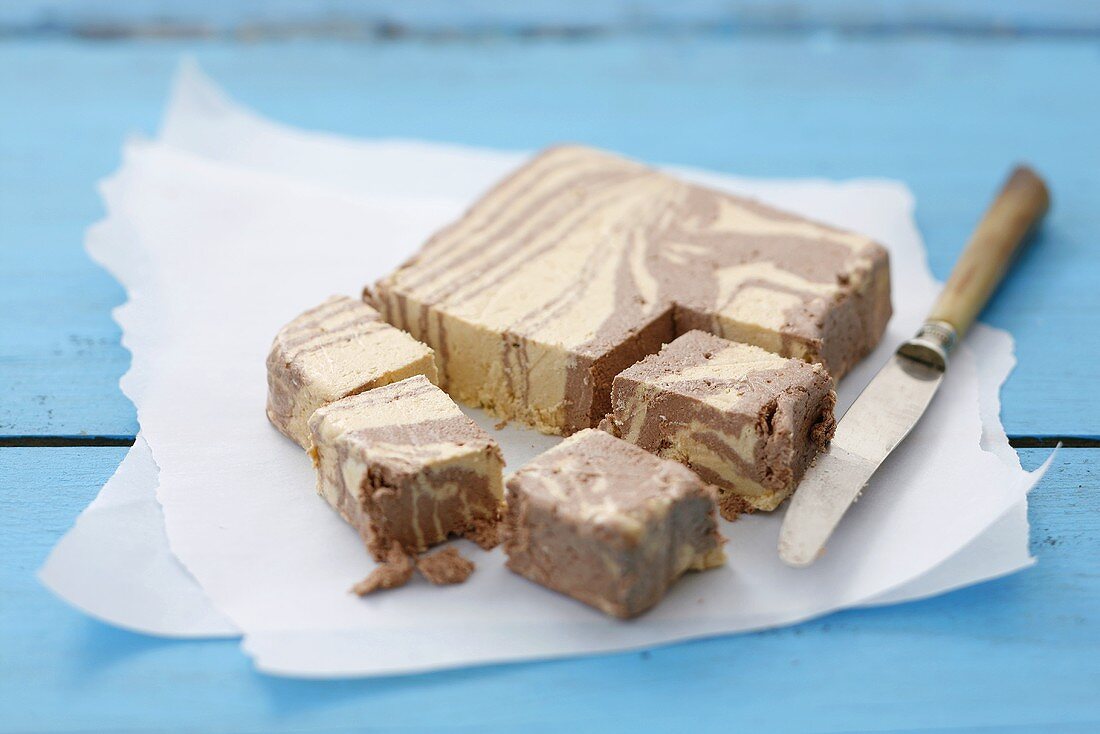 Chocolate halva with knife