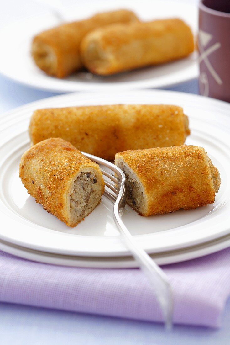 Deep-fried pastry rolls filled with sauerkraut and mushrooms