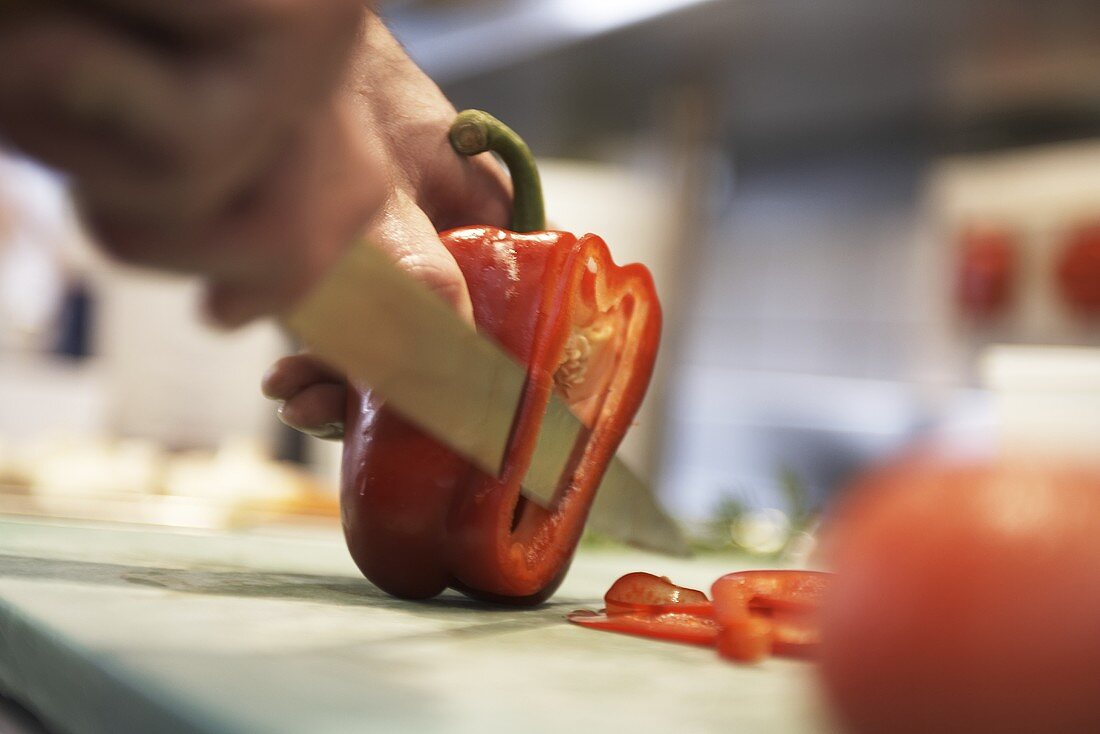 Thinly slicing a red pepper