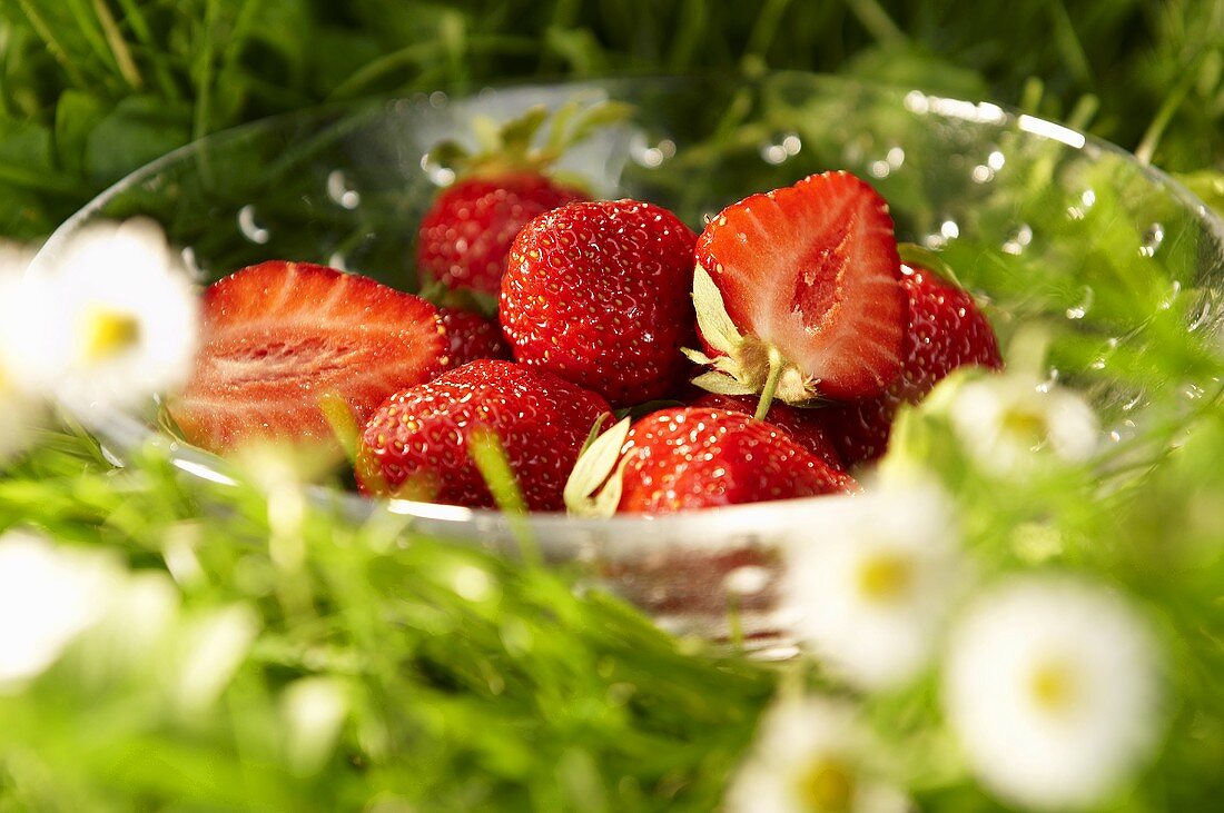 Fresh strawberries in a glass bowl