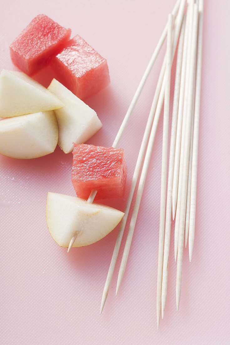 Wooden skewers with fruit