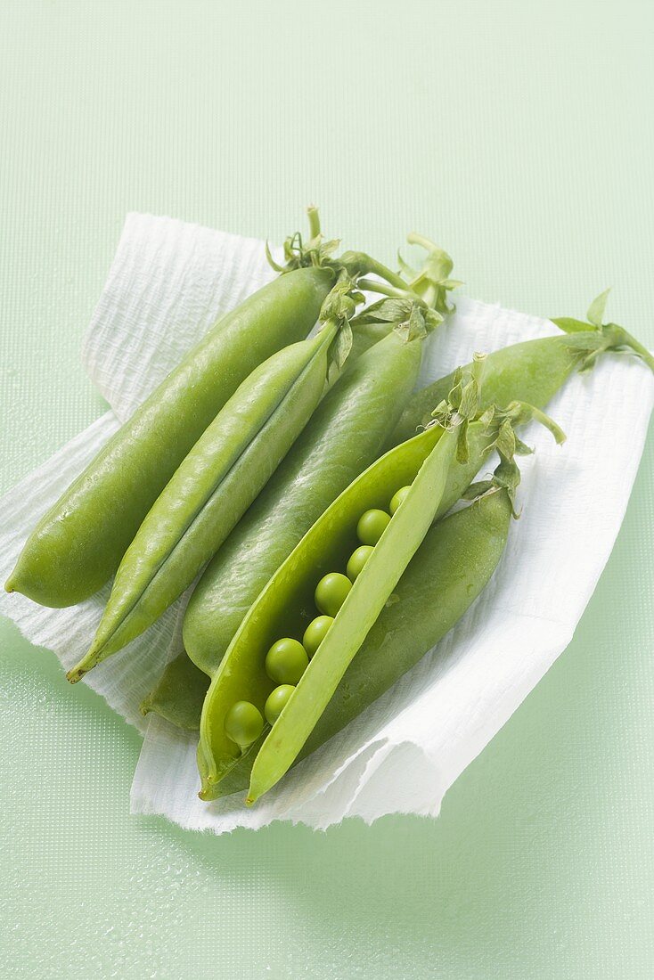 Pea pods, one opened