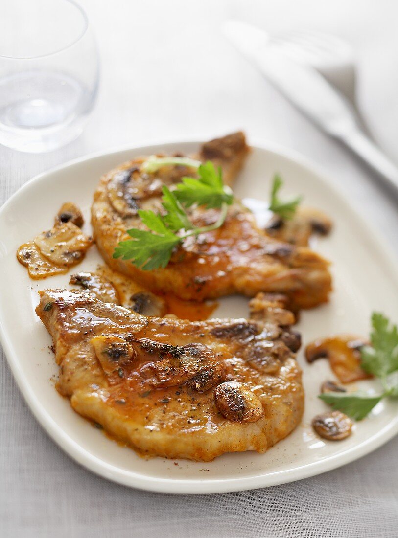 Pork chops with button mushrooms
