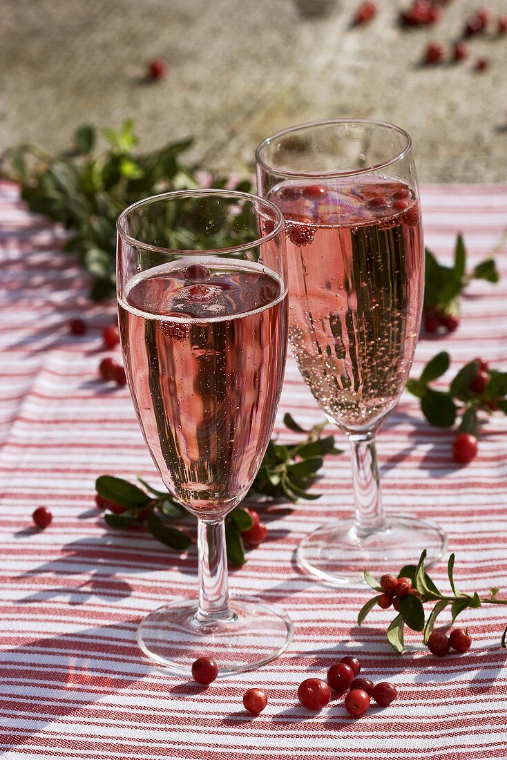 Sparkling wine with grenadine and cranberry syrup