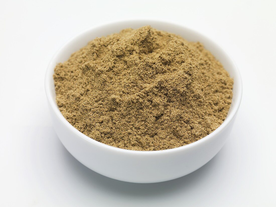 Seasoning mixture for pâtés in a small bowl