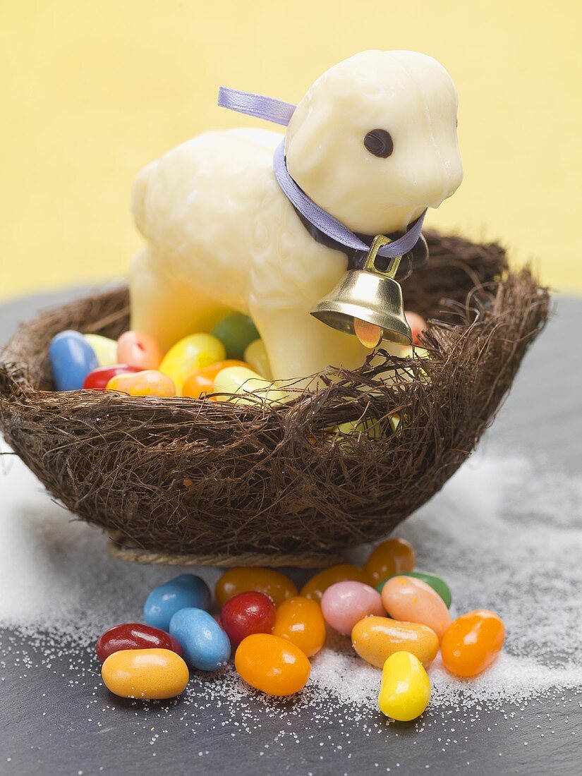 White chocolate lamb and sugar eggs in an Easter nest