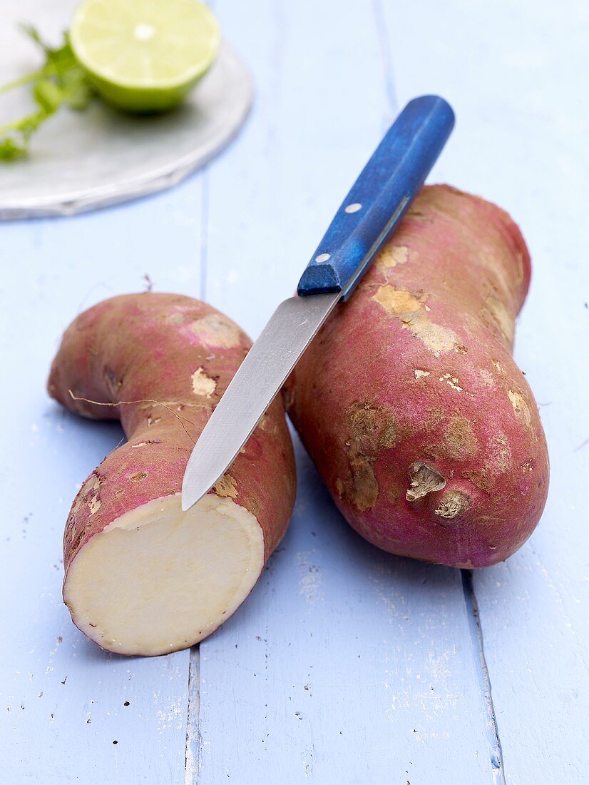 Sweet potatoes with knife