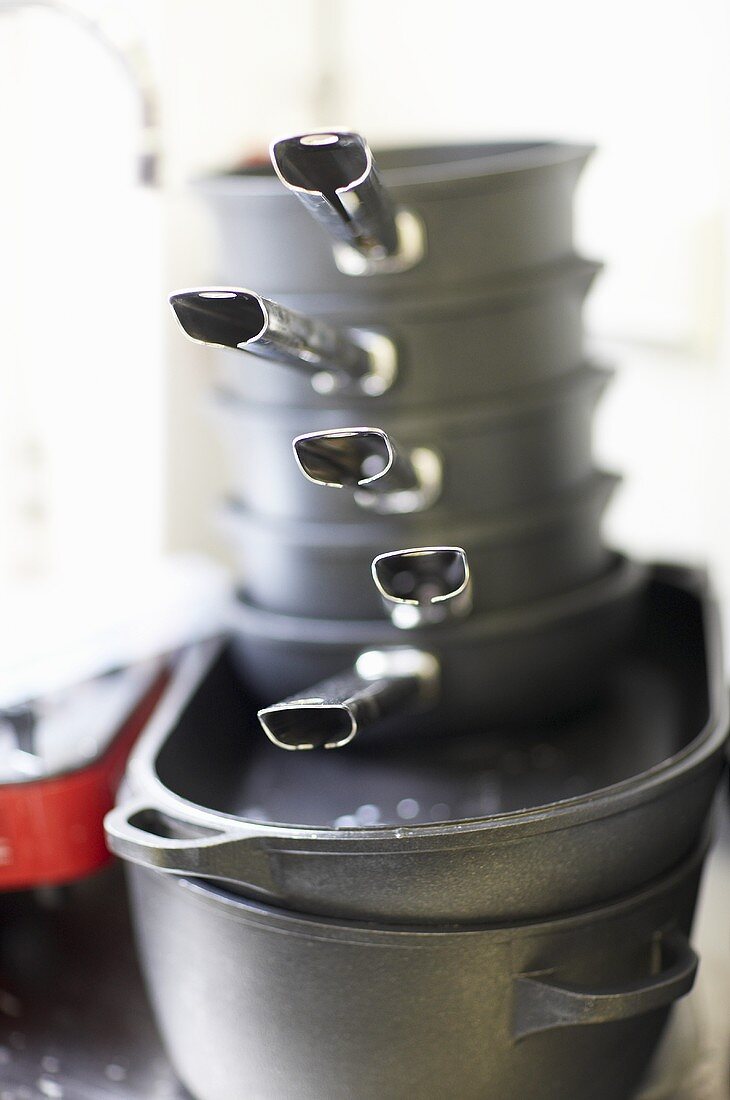 Stacked cast-iron pans