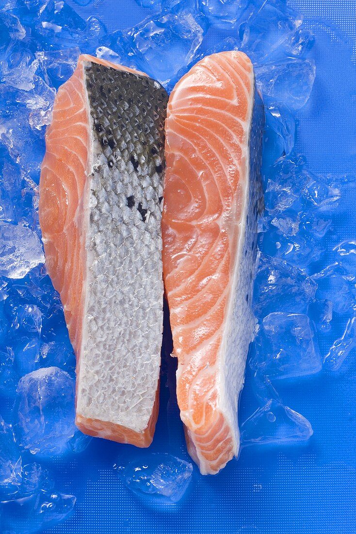 Slices of raw salmon on ice