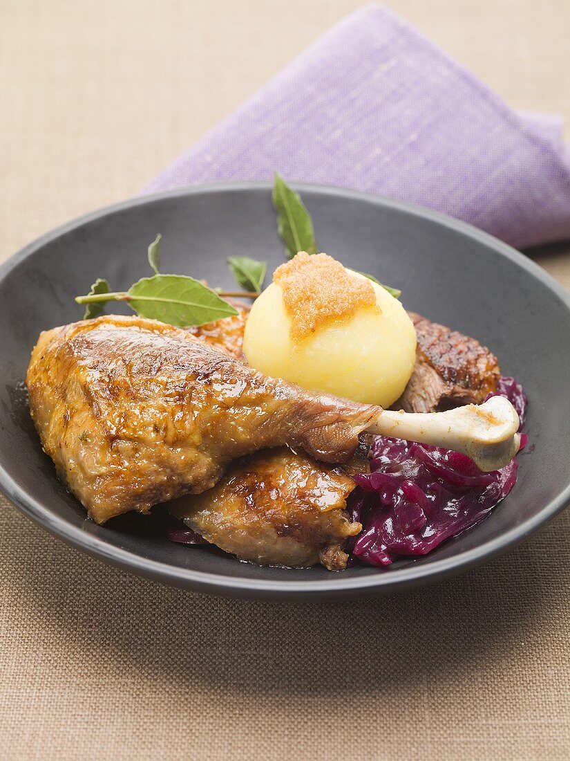 Roast duck with potato dumpling and red cabbage