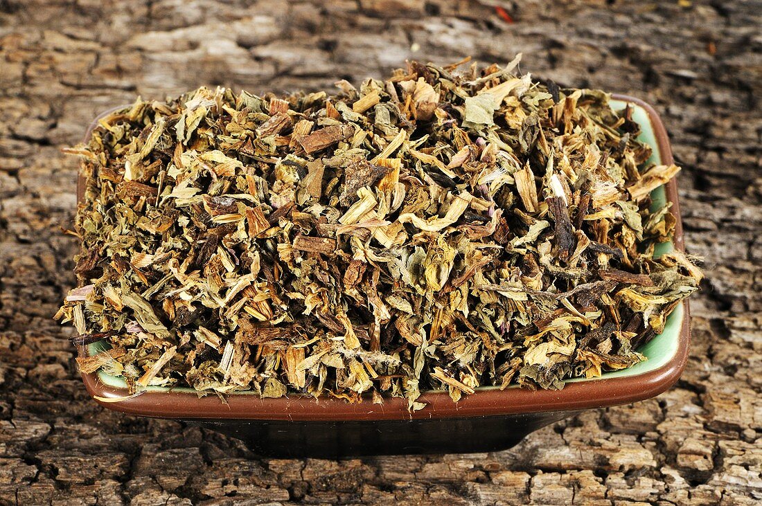 Mongolian dandelion herb in a small dish