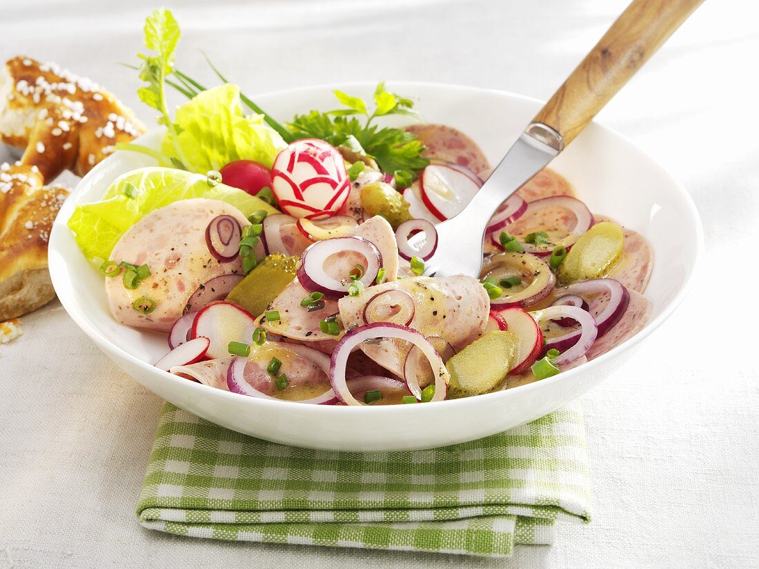 Sausage salad with radishes and gherkins