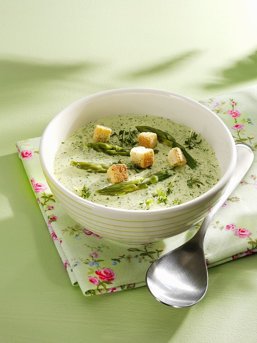 Cream of asparagus soup with cress and croutons